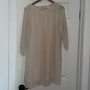 H&M Worn once baby doll dress. Light cream color size 12.